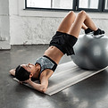 Woman Exercising with Ball