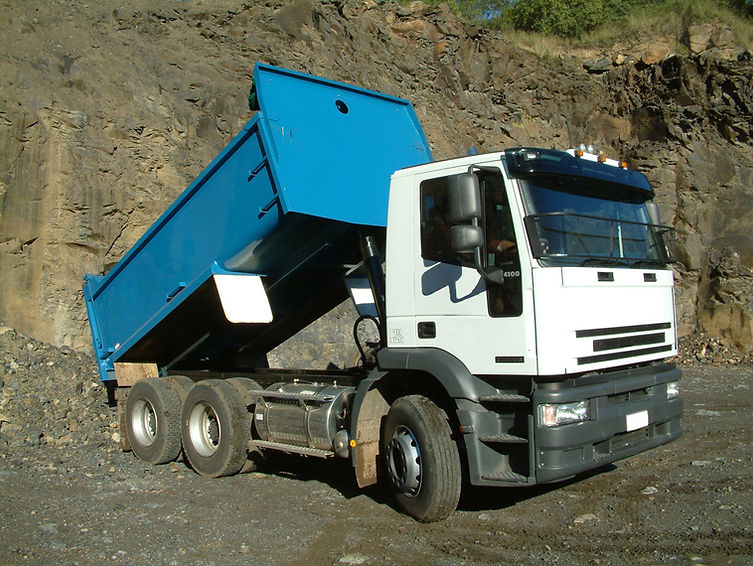 Dump truck taking a dump