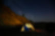 Camper Outside a Tent
