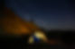 Camper Outside a Tent