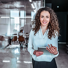 Smiling person with tablet