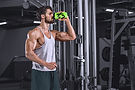 Man Drinking in Gym