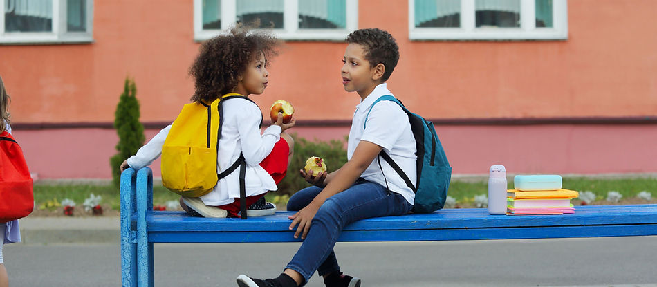 Kids eating on bench