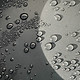 Waterproof fabric texture with water drops close-up