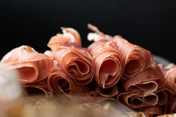 Tranches de prosciutto roulées