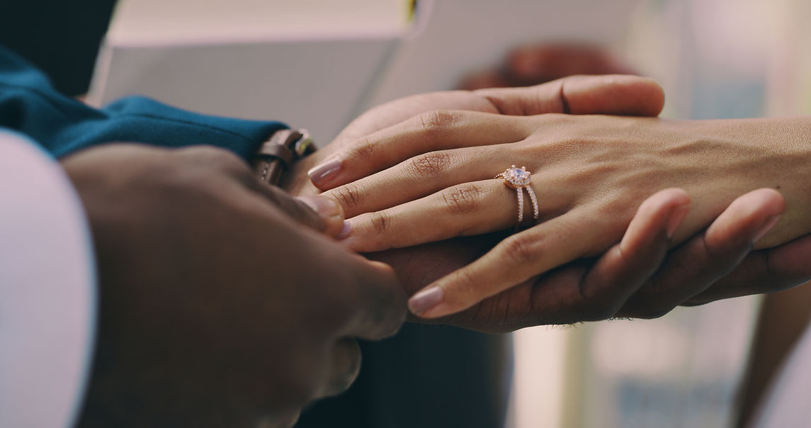 Couple's Hands with Ring