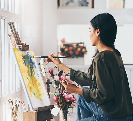 Artist Painting in Studio