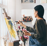 Artist Painting in Studio