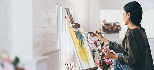 Artist Painting in Studio