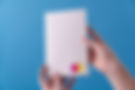Holding White Notebook