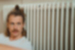 Leaning Against Radiator