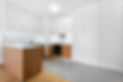 Modern kitchen interior design with white upper walls and wooden finish lower cabinets and island
