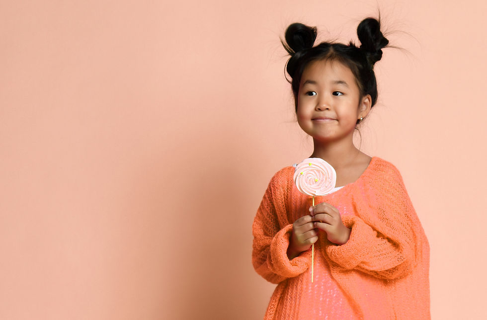Holding a Pink Lollipop