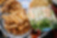 Dishes of Vietnamese grilled pork sausage and spring rolls