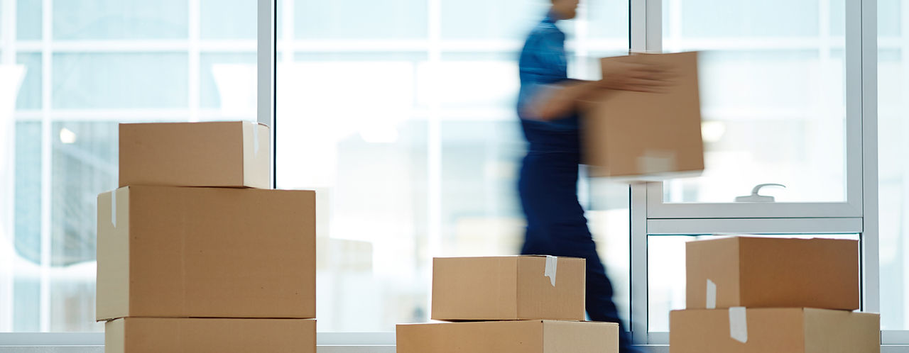 Man Carrying a Box