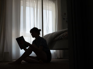 Woman Reading Alone