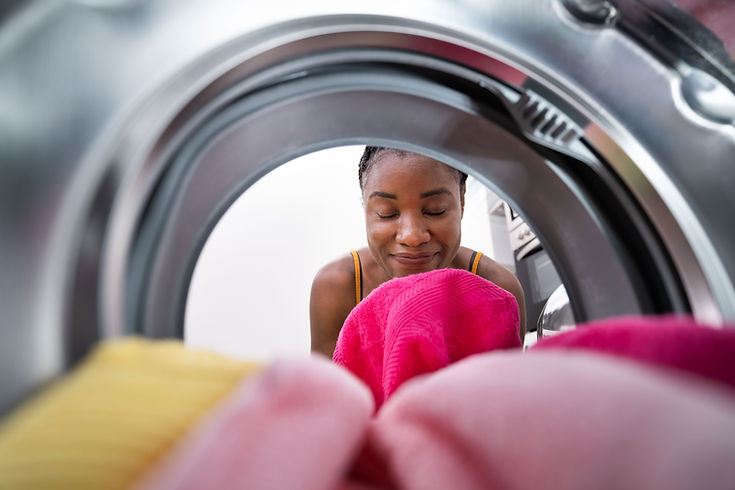 clothes being taken out of a dryer