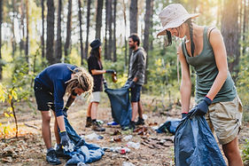 Young people collecting garbage