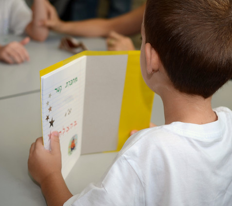 Holding a Notebook
