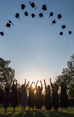 Graduates Tossing Caps