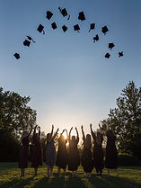 Graduates Tossing Caps