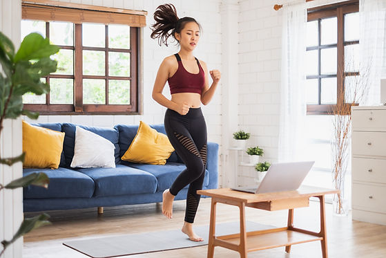 Woman Exercising Indoors