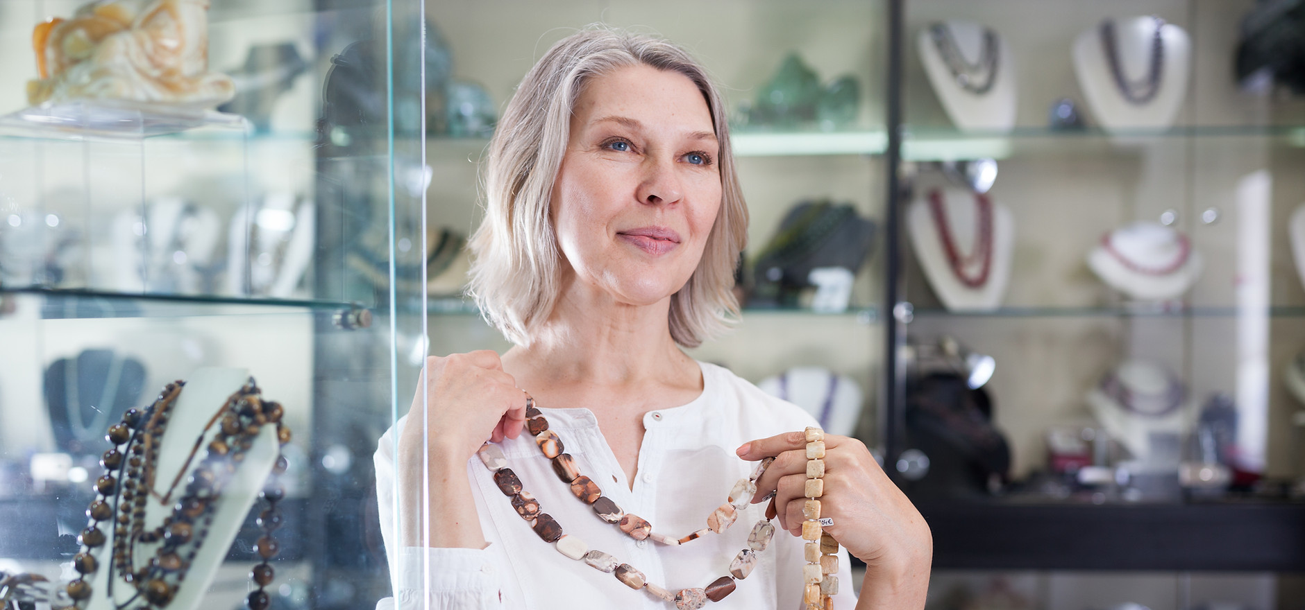 Trying on a Necklace