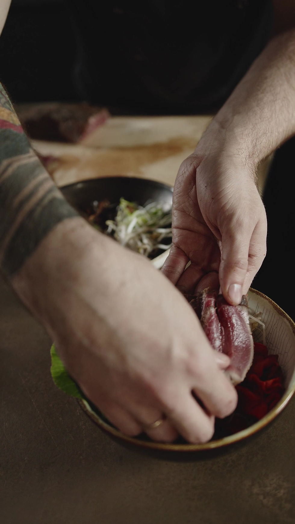 Chef Preparing Beef Bowls