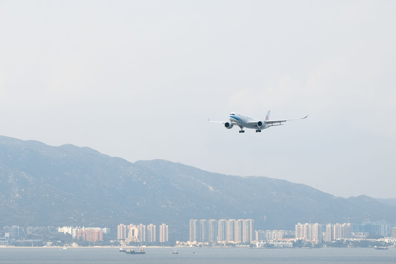 Airplane Over Mountains