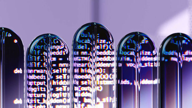 blue, purple, and white code text reflected in clear test tubes with a light purple background in the back