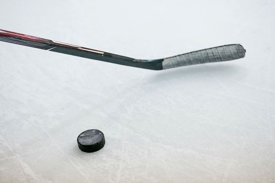 Bâton de hockey et rondelle