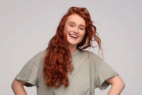 Red haired woman smiling