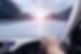 hand driving a car with speed on the street