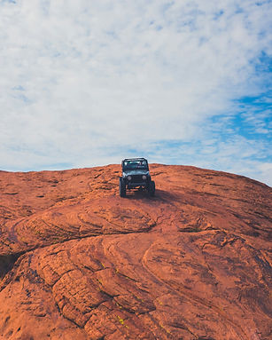Jeep on red rock