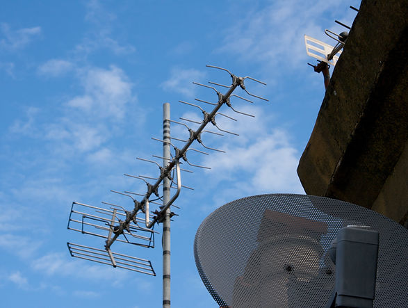Rooftop with satellite dish and TV aerials