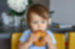 Baby Eating a Bagel