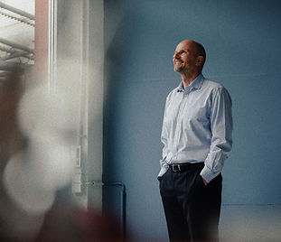 Senior leader contemplating a strategic career pivot or executive transition in a high-stakes corporate setting.