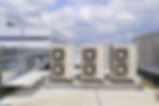 Air compressor on roof of factory