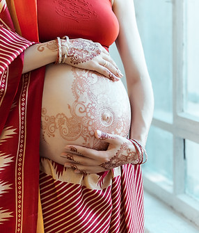Pregnant Woman with Henna Tattoo