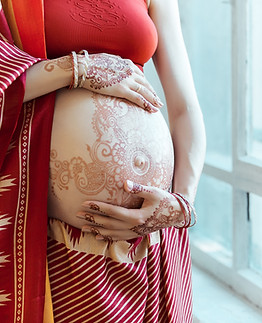 Pregnant Woman with Henna Tattoo