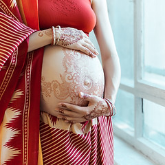 Pregnant Woman with Henna Tattoo
