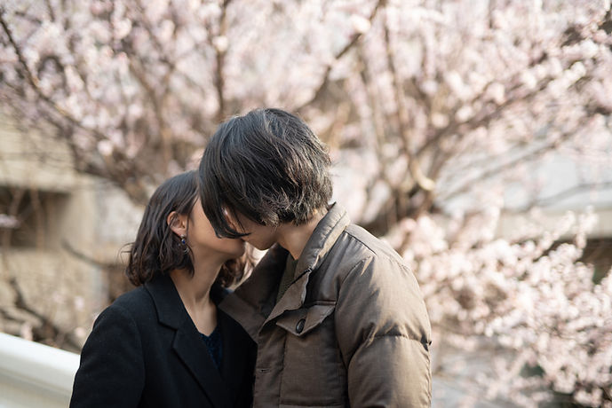 Couple Under Blossoms