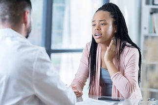 An adult girl with a counsellor