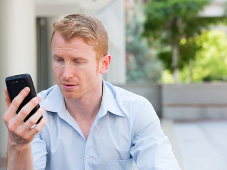 A man checking the jobs on his service management app