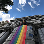 Building With Rainbow Flag