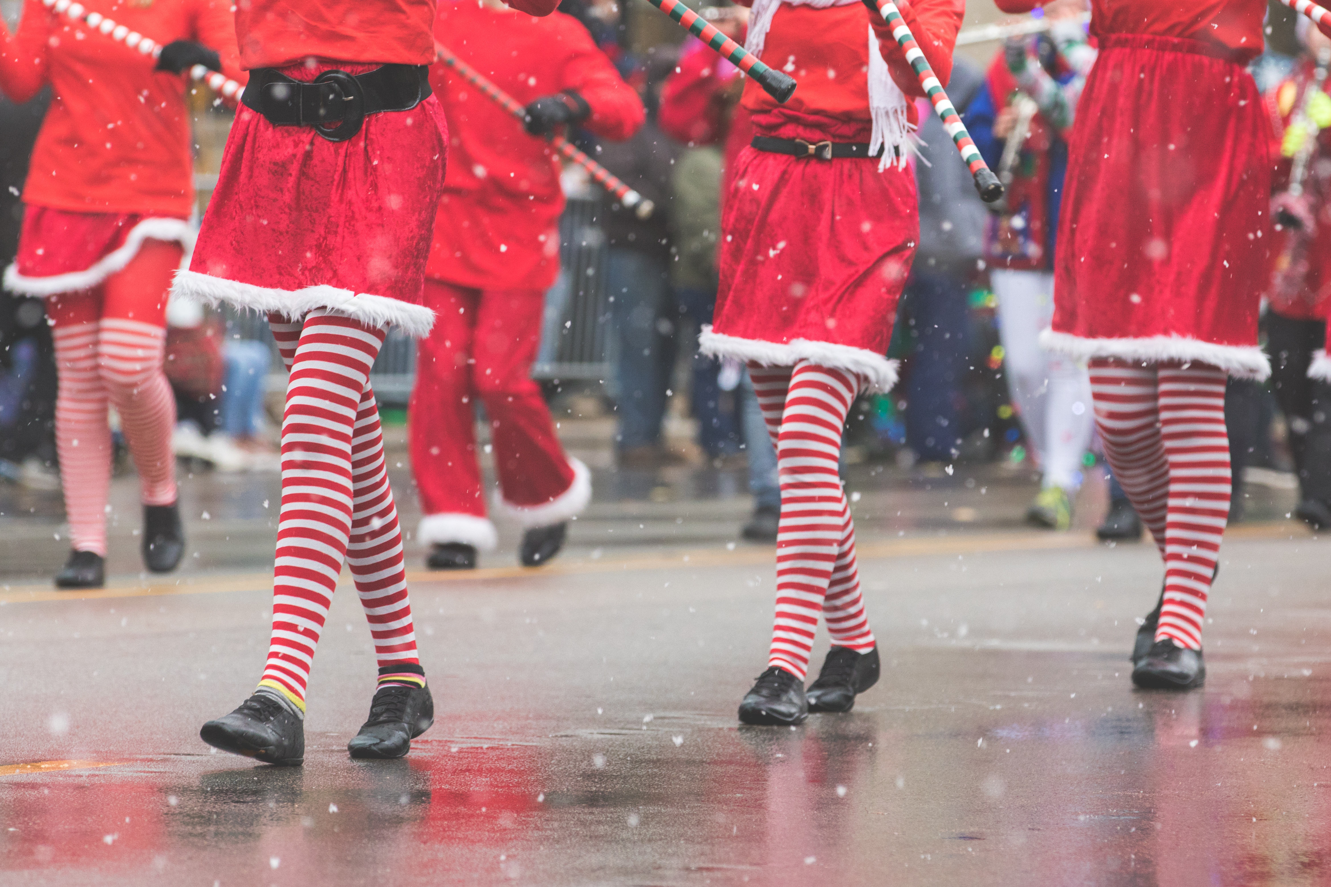 Holiday parade dancers performing for spectators