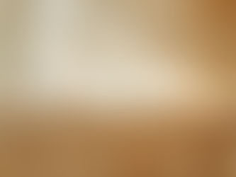 A bamboo and white tile kitchen in the morning light.