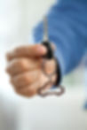 Giving new car keys after car key cutting
