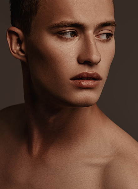 Man Looking Away with well-defined jawline.