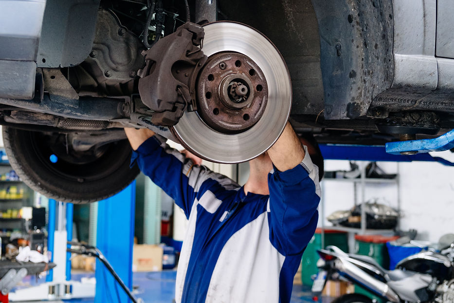 Man Repairing Car